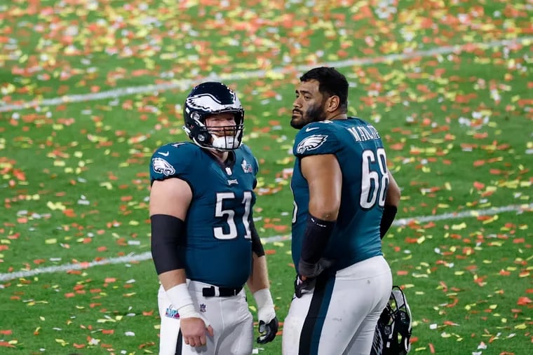 Philadelphia Eagles center Cam Jurgens (left) and offensive tackle Jordan Mailata after a Super Bowl LVII loss against the Kansas City Chiefs at State Farm Stadium on Sunday, Feb. 12, 2023, in Glendale, AZ.