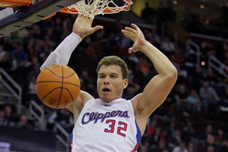 Blake Griffin and Chris Paul have formed a dangerous combination so far this season. (Mark Duncan/AP)