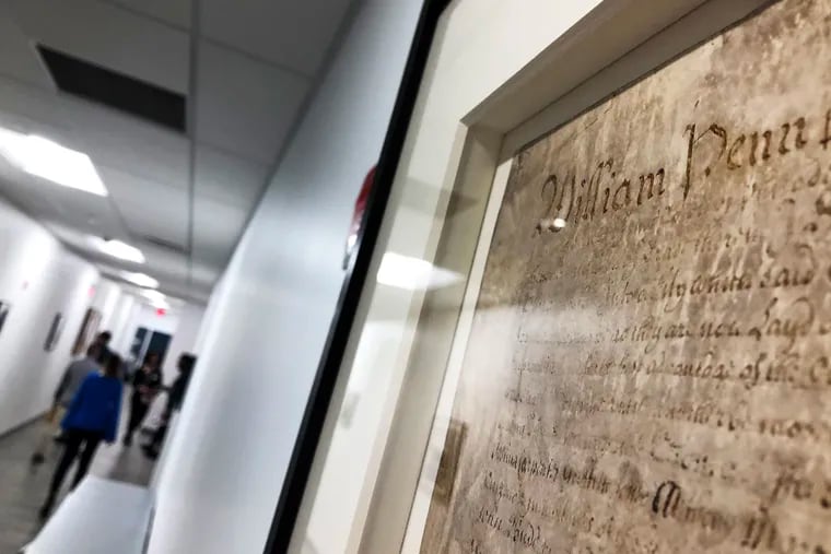A copy of the William Penn City Charter, from 1701, hangs in the hallway of the new Philadelphia City Archives on Spring Garden Street.