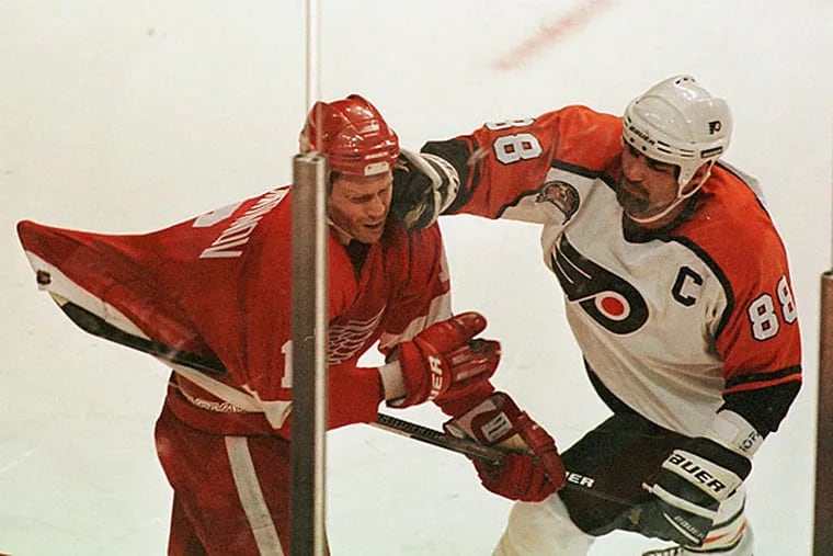 Eric Lindros roughs up the Red Wings' Vladimir Konstantinov during Game 1 of the Flyers' eventual Stanley Cup Final loss to Detroit in 1997.