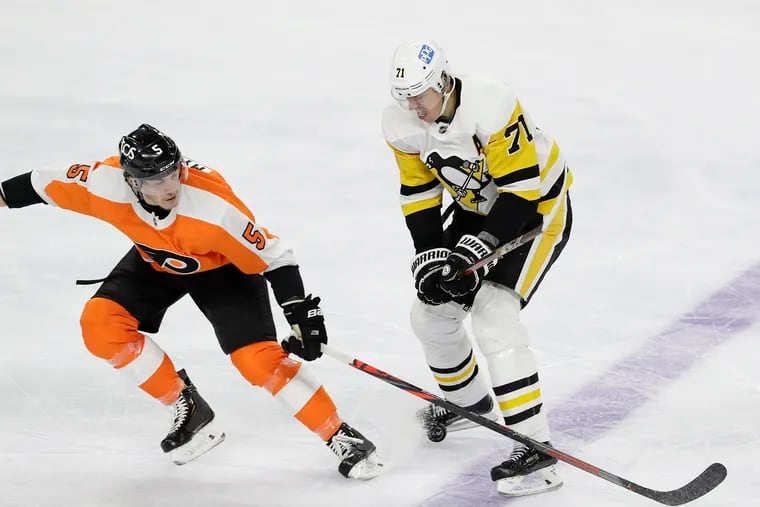 Without Sidney Crosby, Evgeni Malkin has stepped up for the Penguins in his career. Malkin (right) is shown trying to get past Flyers defenseman Phil Myers earlier this season.