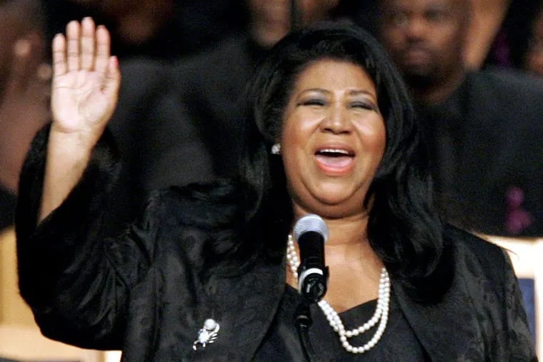 In this Nov. 2, 2005 file photo, Aretha Franklin sings during the funeral for civil rights pioneer Rosa Parks at the Greater Grace Temple in Detroit. Franklin died Aug. 16, 2018 of pancreatic cancer at the age of 76.