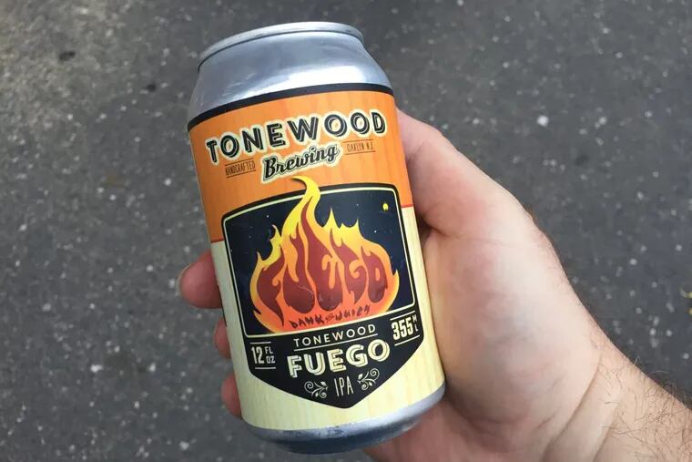 A can of Fuego, a juicy, hazy IPA from Tonewood Brewing in Oaklyn.