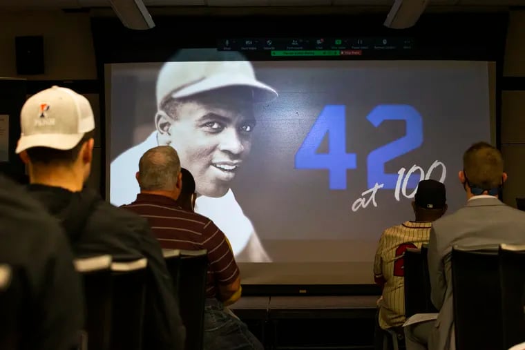 The Claire Smith Center for Sports Media presented the symposium, Jackie Robinson and the 75th Anniversary of the Integration of Major League Baseball. on April 8, 2022. Attendees watch an ESPN film on the Jackie Robinson legacy