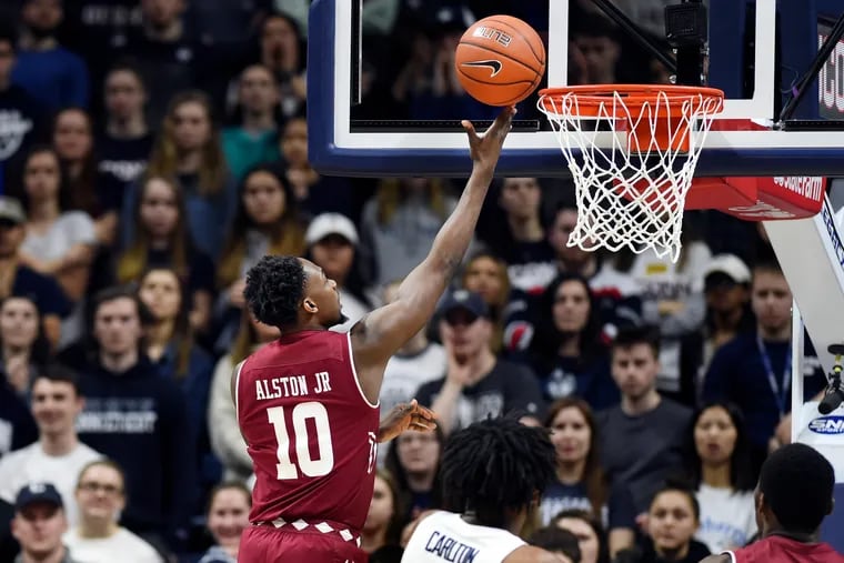 Temple's Shizz Alston Jr. (10) goes up for two of his game-high 34 points in the second half of an NCAA college basketball game against Connecticut, Thursday, March 7, 2019, in Storrs, Conn. (AP Photo/Stephen Dunn)