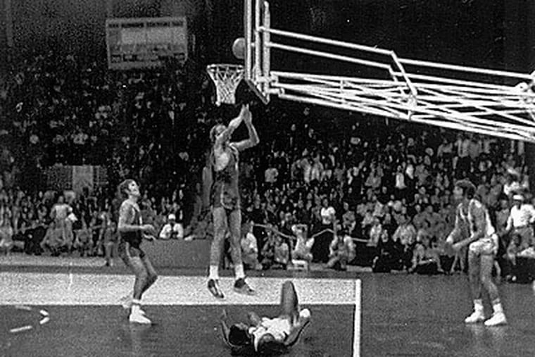 Russia's Alexander Belov scores the game-winning basket in the gold medal game at the 1972 Olympics. (AP file photo)