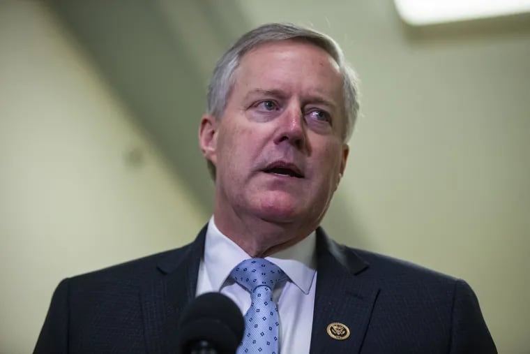 Rep. Mark Meadows, R-N.C., speaks to members of the media on Capitol Hill on Friday. (Al Drago / Bloomberg)