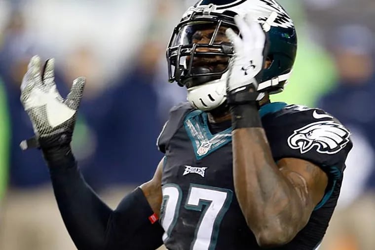 Malcolm Jenkins reacts after missing an interception attempt against the Seattle Seahawks. (Yong Kim/Staff Photographer)