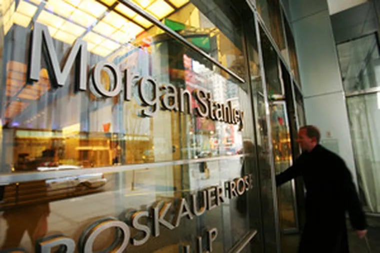 Morgan Stanley&#0039;s write-down, nearly triple the amount it warned of in November, pushed the investment house to its first quarterly loss.