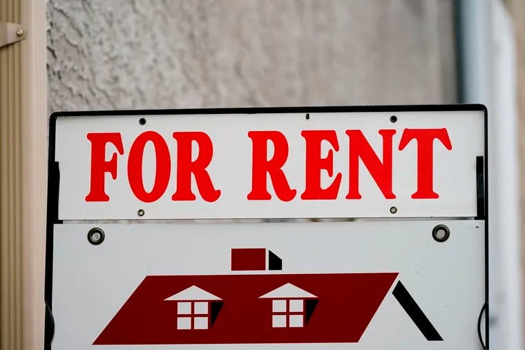 This file photo shows a "For Rent" sign displayed outside a Philadelphia building in 2022. Philadelphia renters pay less of a premium for solo living than renters in many other big cities and the country as a whole, according to Zillow.