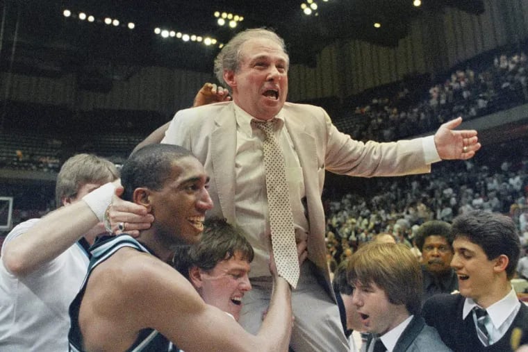 Villanova coach Rollie Massimino takes a victory ride on his players’ shoulders March 24, 1985.
