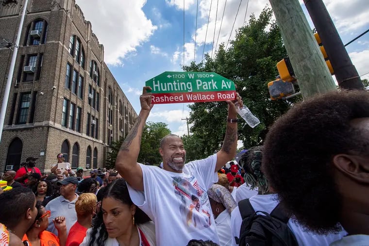 Former NBA player Rasheed Wallace races his street sign at the Simon Gratz High School in Philadelphia, Pa. Friday, June 24, 2022. The block of 18th and Hunting Park Ave is officially be named Rasheed Wallace Road.