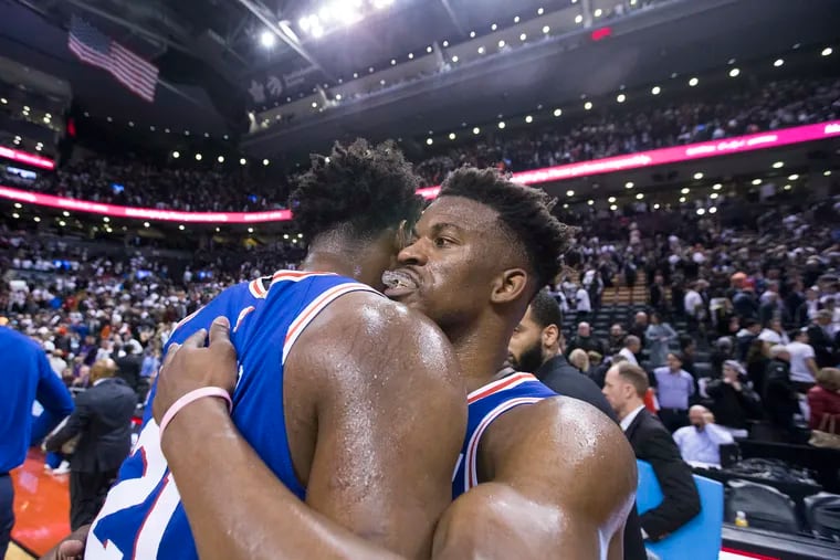Gonna be some more hugs tonight between Joel Embiid (left) and Jimmy Butler after the Sixers take the series lead against visiting Toronto.