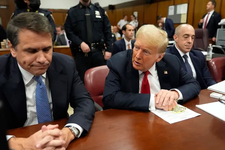 Former President Donald Trump speaks to his attorney Todd Blanche before the start of proceedings in Manhattan Criminal Court on Tuesday, May 28, 2024, in New York.