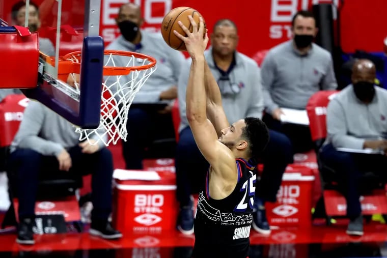 Ben Simmons throws down a dunk in the first half of Game 2 against the Wizards.