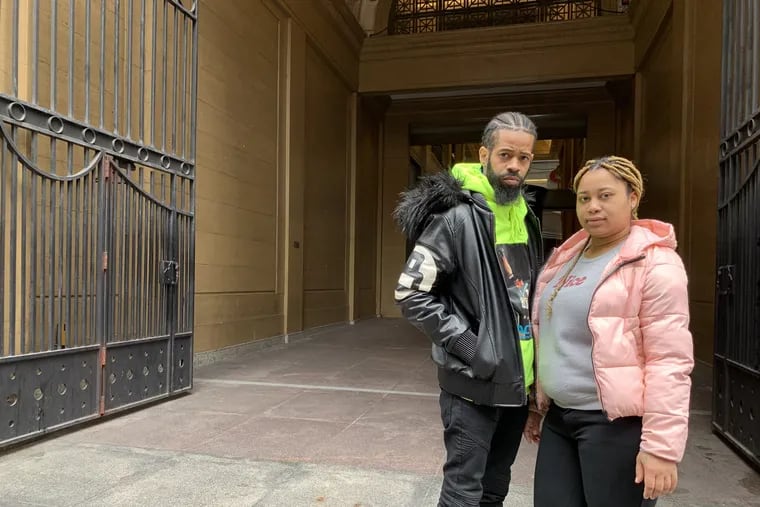Andrew Seawright and Senitra Bundy outside the Widener Building on Chestnut Street, where the city's eviction hearings are held. Seawright said a moratorium on evictions would give him comfort if he lost his job due to coronavirus.