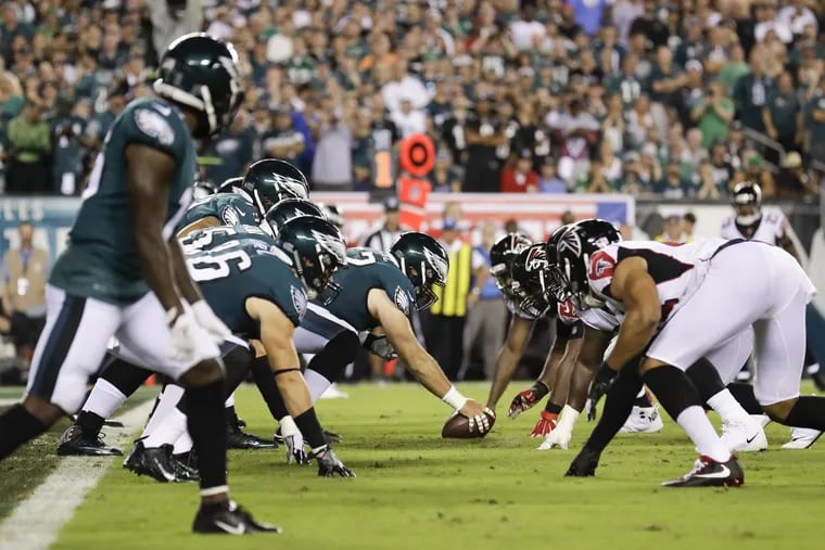 The Eagles offense sets up against the Falcons defense.