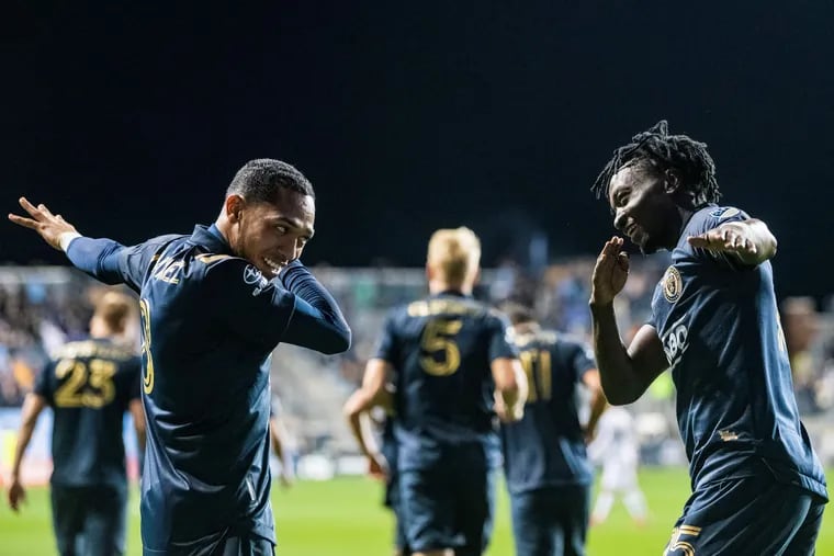 José Andrés Martínez (left) and Olivier Mbaizo (right) celebrate after the Union's opening goal.