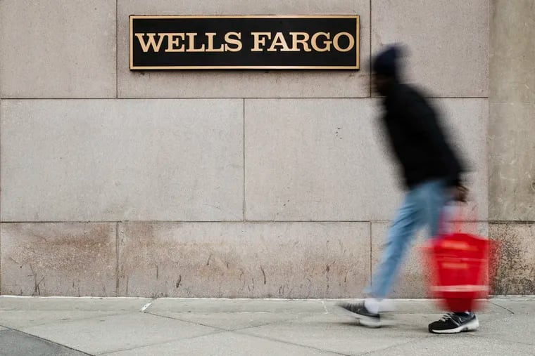 FILE - This Nov. 29, 2018, file photo shows a Wells Fargo bank location in Philadelphia. Wells Fargo & Co. reports financial results Tuesday, Oct. 14, 2019.