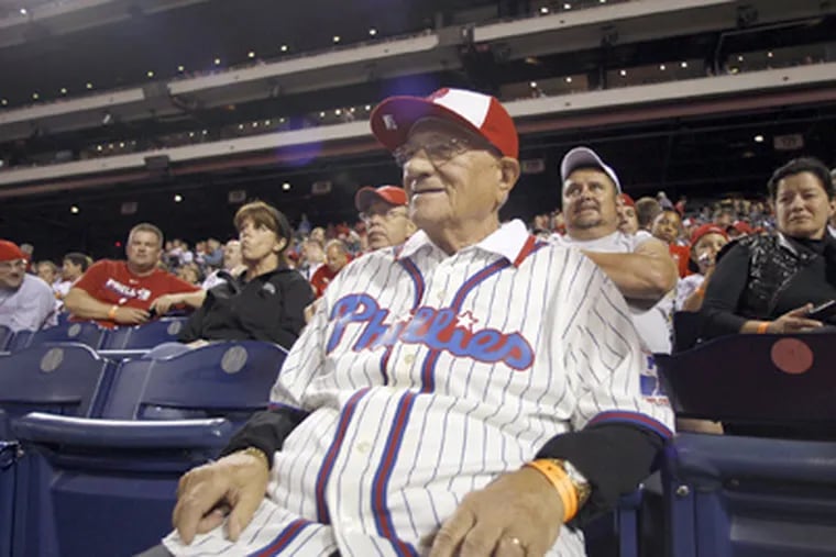 Phillies fan Ray DiCrescenzo, 91, watches the Phillies play the Washington Nationals on Wednesday. (Yong Kim / Staff Photographer)