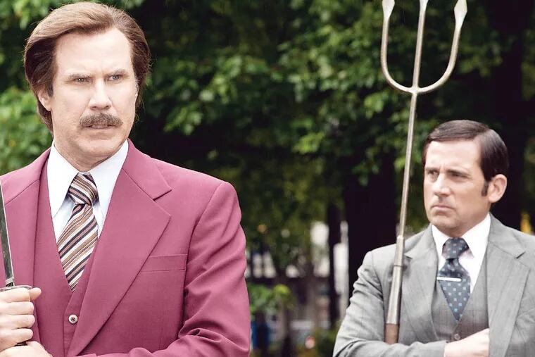 This image released by Paramount Pictures shows Will Ferrell as Ron Burgundy, left, and Steve Carell as Brick Tamland in a scene from "Anchorman 2: The Legend Continues." (AP Photo/Paramount Pictures, Gemma LaMana)