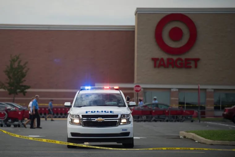 Police at the scene of a shooting at a Target store at 7400 Bustleton Ave.