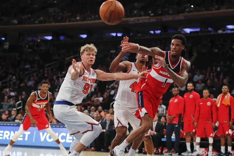 Chris McCullough right) will spend his summer with the Sixers.