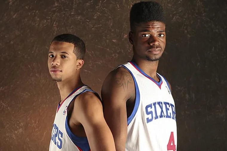 Sixers rookies Michael Carter-Williams (left) and Nerlens Noel (right). (Steven M. Falk/Staff Photographer)