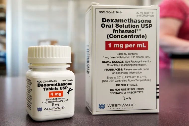 This photo shows a bottle and box for dexamethasone in a pharmacy in Omaha, Neb.