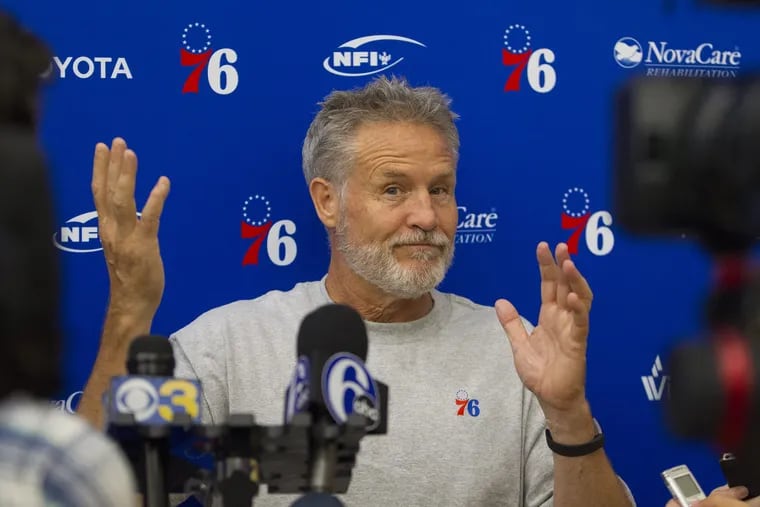 Brett Brown: international man of mystery? Or just trying to get to his hotel room?