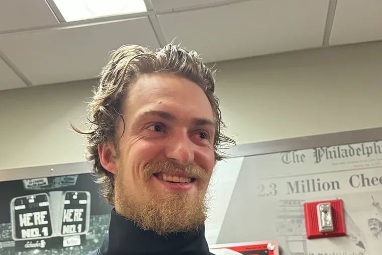 Travis Sanheim modeling off his new undershirt which includes added neck protection. Sanheim plans to start wearing the gear full-time for games.