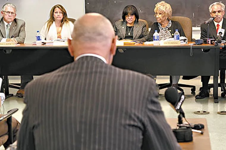 Clifford Haines, attorney for PHA director Carl Greene, addresses the Philadelphia Housing Authority board, left to right, Patrick Eiding, Debra Brady, Jannie Blackwell, Nellie Reynolds, and John Street, during a public meeting at the PHA on Thursday. (Laurence Kesterson / Staff Photographer)