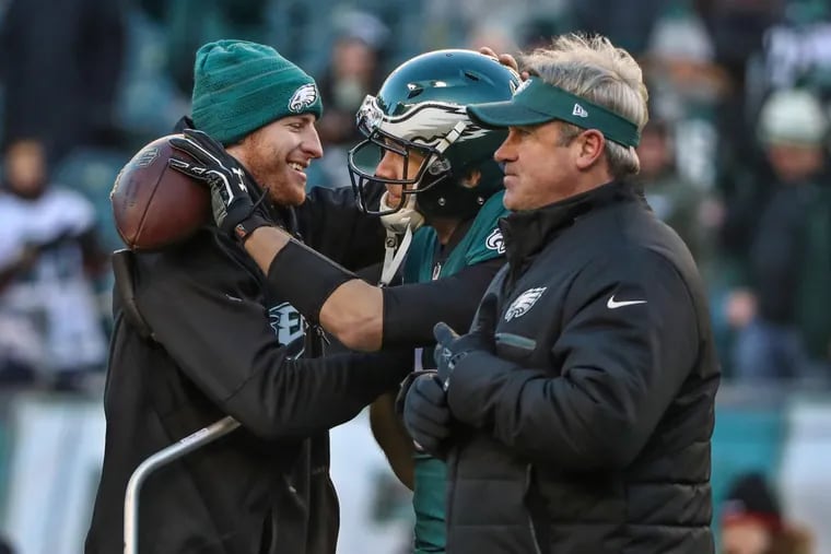 Eagles' Carson Wentz goes from star to spectator, but he still contributes