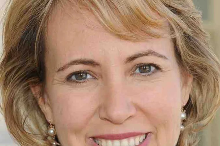 Rep. Gabrielle Giffords , one of 13 wounded. Six died.