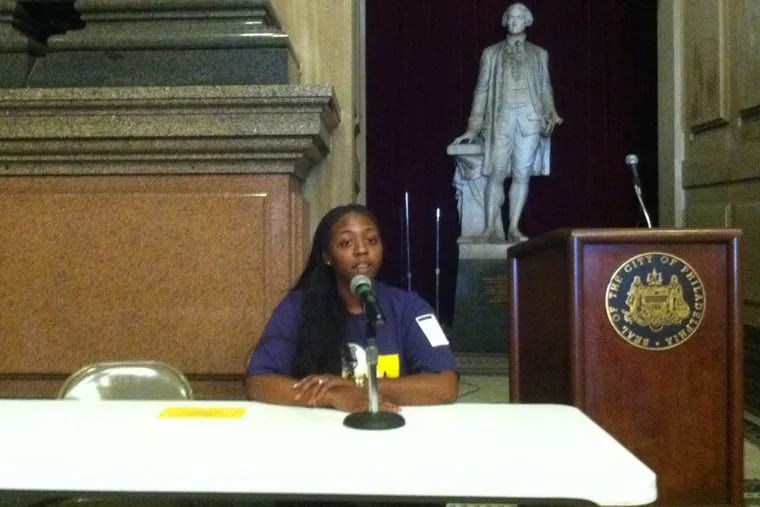 Security guard Larhonda Whitmore, 24, earns $10.45 an hour during the school year when she is assigned to a local university. Whitmore spoke Monday during a panel on the ongoing fight for racial and economic justice for black working people in the city of Philadelphia.
