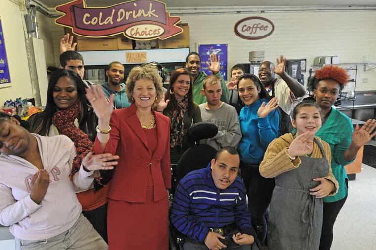 Bancroft president and chief executive Toni Pergolin (center) in the Sweet Success store with students and staff. &quot;I run the place, but I don't do what these people do,&quot; she says of staffers. &quot;They inspire me.&quot;