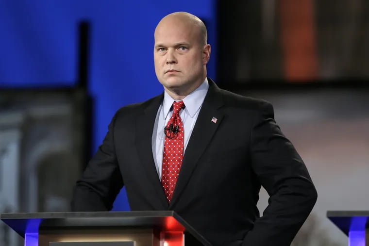 In this April 24, 2014, file photo, then-Iowa Republican senatorial candidate and former U.S. Attorney Matt Whitaker watches before a live televised debate in Johnston, Iowa.