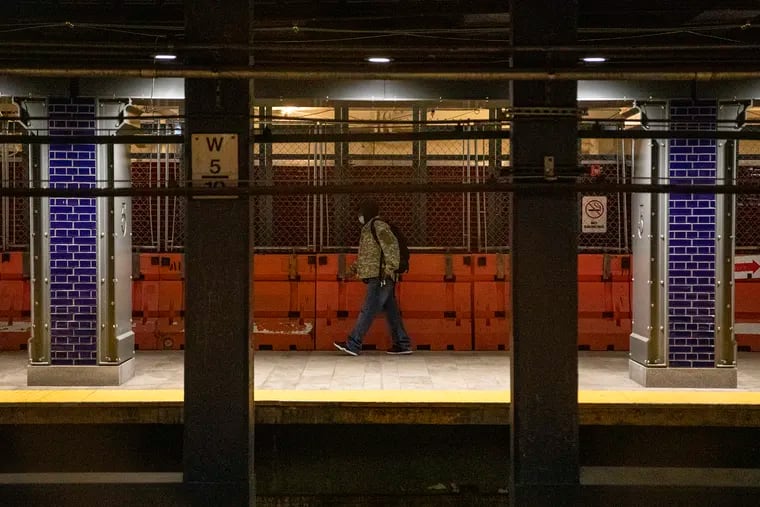 A man walks through Fifth Street Station by Independence Hall to await a ride on the Market-Frankford Line.