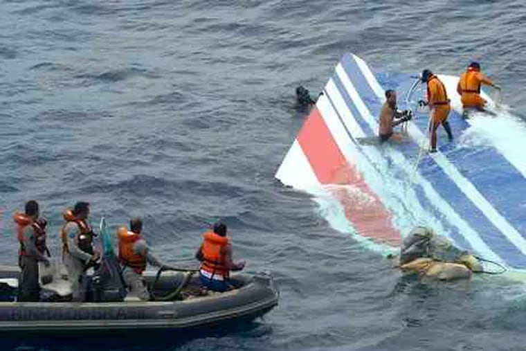 A large tail section from the Air France jet that crashed last week is recovered from the Atlantic Ocean bythe Brazilian navy. Authorities also said eight more bodies were found yesterday, raising the number to 24 since the jet crashed May 31 en route from Rio de Janeiro to Paris with 228 aboard. Story and photo on A2.