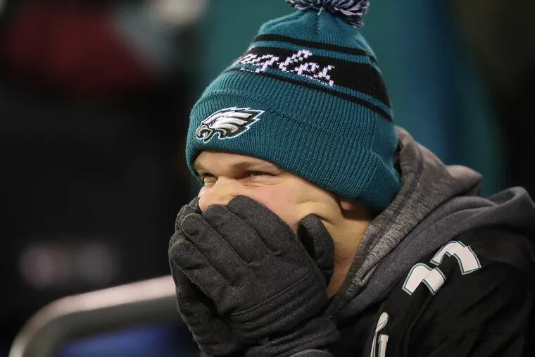 An Eagles fan watches late in the 4th quarter. Eagles lose 27-20 to the Dallas Cowboys at Lincoln Financial Field in Philadelphia, PA on November 11, 2018. DAVID MAIALETTI / Staff Photographer