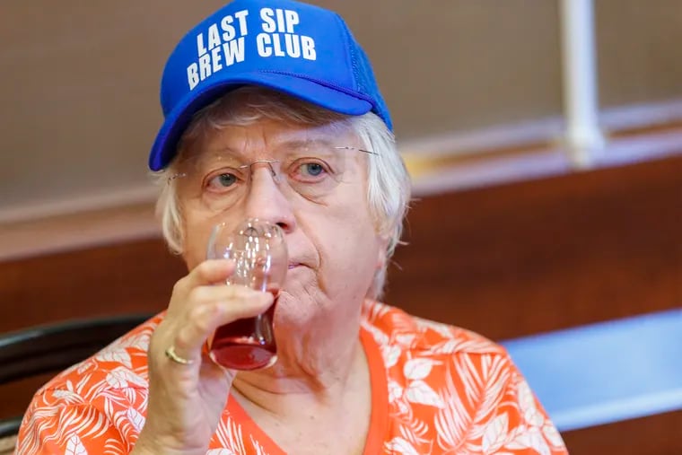Kitty Schaefer, 82, contemplates the flavors of the beer she just tasted during her Last Sips Brew Club meeting at Wesley Enhanced Living on September 12, 2019.