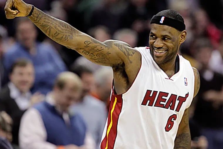 LeBron James and the Heat hold a 1-0 series lead over the Sixers. (AP Photo/Chuck Burton)