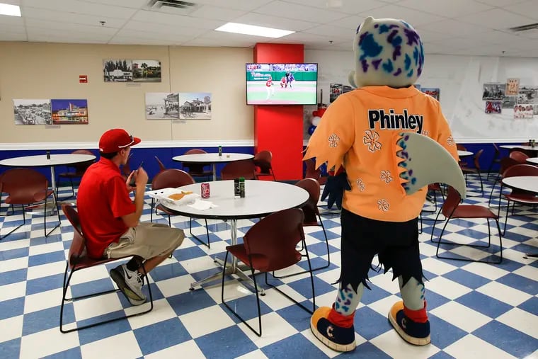 Phinley, the Clearwater Threshers mascot watches the Phillies play the Houston Astros during a spring training game on Saturday, March 16, 2019 inside the lunch room at Spectrum Field in Clearwater, FL.  The Theshers are a minor league affiliate of the Phillies.