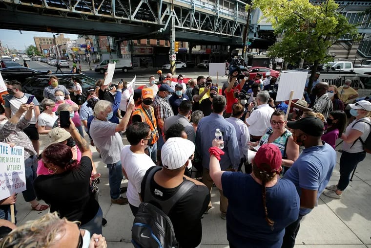 A group protests at Kensington and Allegheny Avenues in Philadelphia, Pa. on July 8, 2020. The Harrowgate Civic Association planned the protest to confront people in Kensington about the issues in their neighborhood.