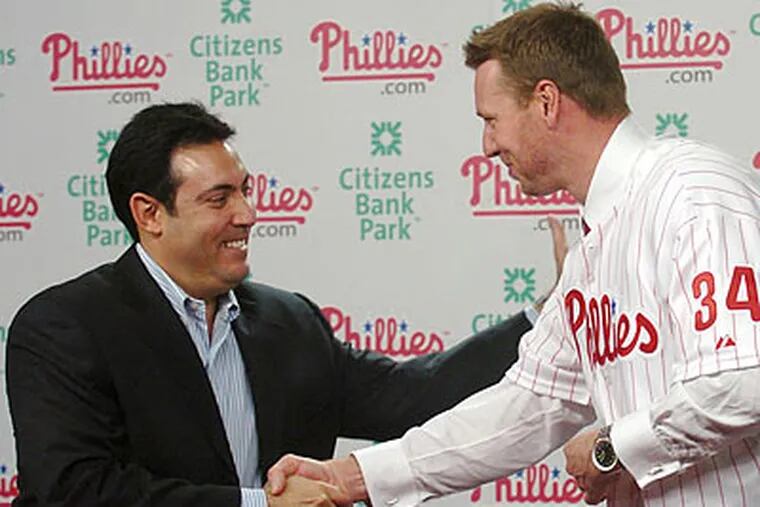 Phillies general manager Ruben Amaro Jr. landed the prize wanted in ace starting pitcher Roy Halladay. (Clem Murray/Staff Photographer)