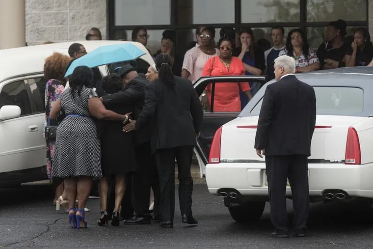People gather for 18-year-old Bianca Roberson's viewing and funeral at St. Paul's Baptist Church in West Chester on Friday.