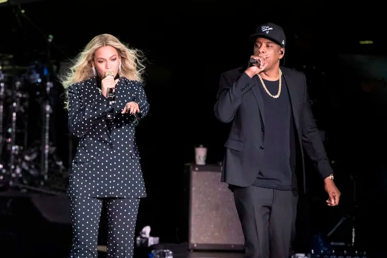 FILE - In this Nov. 4, 2016 file photo, Beyonce and Jay-Z perform during a Democratic presidential candidate Hillary Clinton campaign rally in Cleveland. The power couple will be honored for accelerating LGBTQ acceptance at the GLAAD Media Awards on March 28.