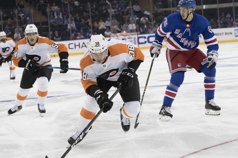 Flyers center Corban Knight controls the puck during a preseason game against the New York Rangers.