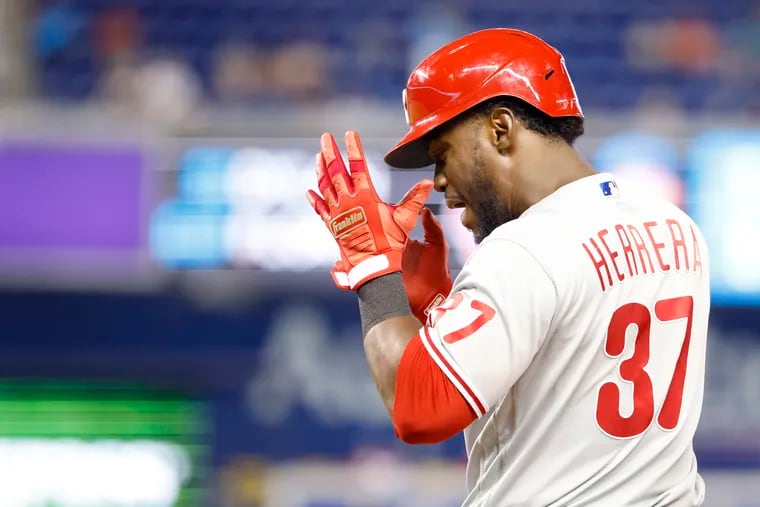 Philadelphia Phillies' Odubel Herrera (37) reacts after singling in a run during the 10th inning of a baseball game against the Miami Marlins, Sunday, Sept. 5, 2021, in Miami. (AP Photo/Rhona Wise)