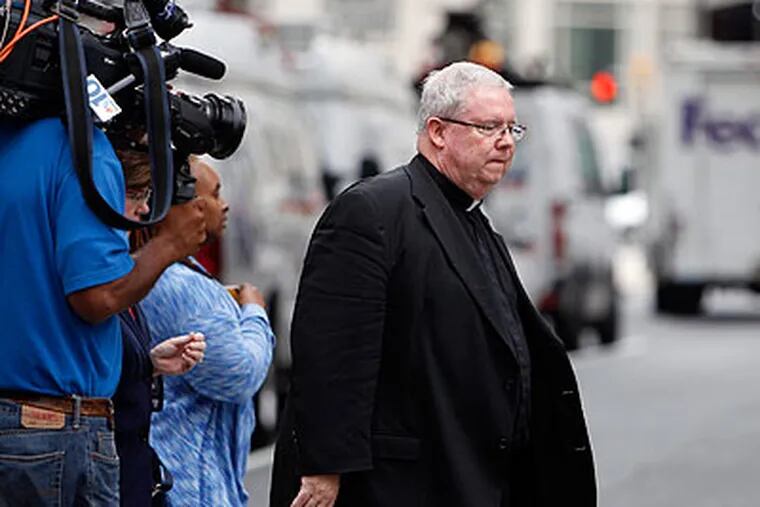 Msgr. William J. Lynn leaving the Criminal Justice Center on June 18. He was assistant pastor at the writer’s parish years ago. DAVID MAIALETTI / Staff Photographer